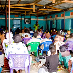 Carol and Delphin meeting women in Magwi County